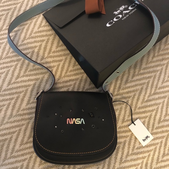 coach nasa saddle bag